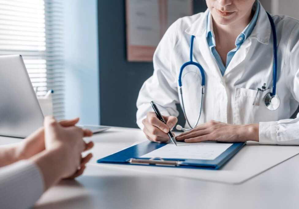 doctor speaking with patient