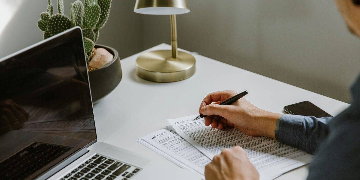 woman completing CRA form